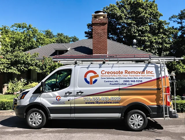 Maynard Chimney Sweep technician removing creosote safely in Maynard, MA