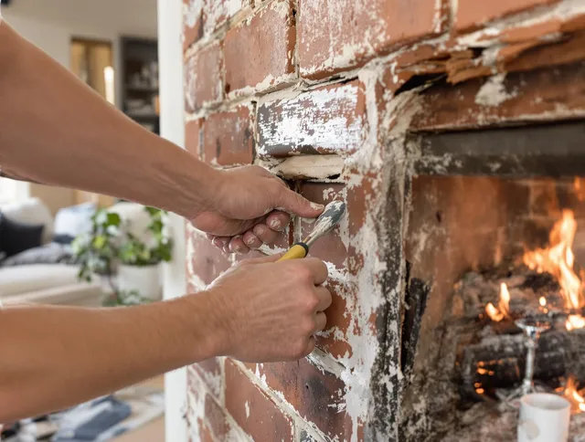 Routine fireplace repair by Maynard Chimney Sweep in Maynard, MA
